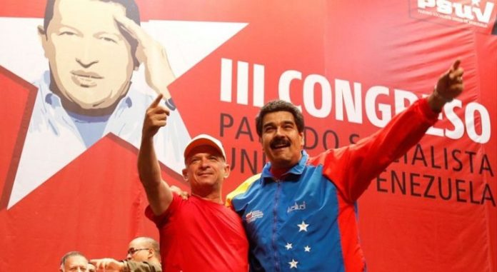 Hugo Carvajal y Nicolás Maduro